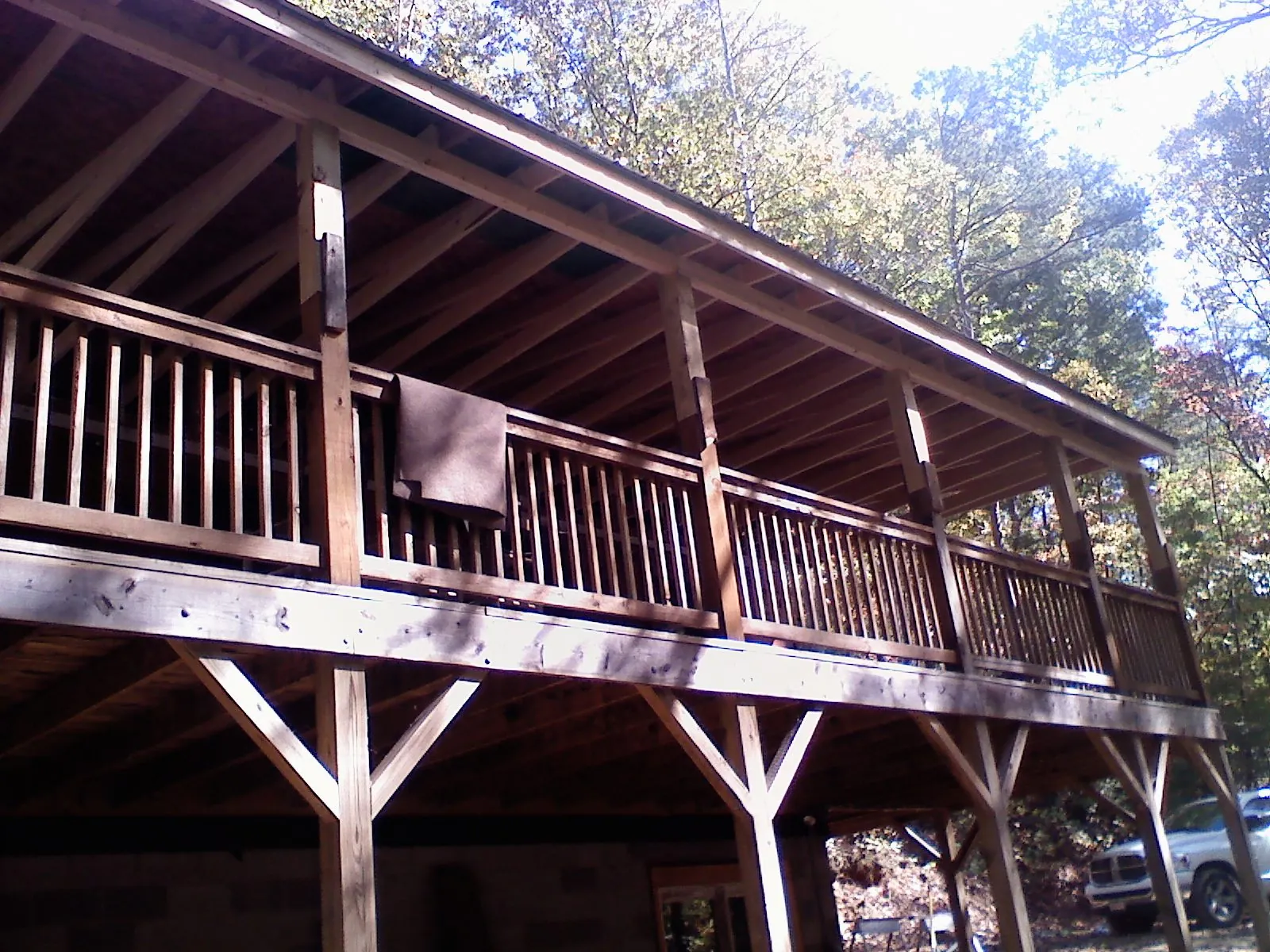 Timber framing under a new elevated porch and deck — Roof Leak Repair in Sherrill by Roofing Brothers
